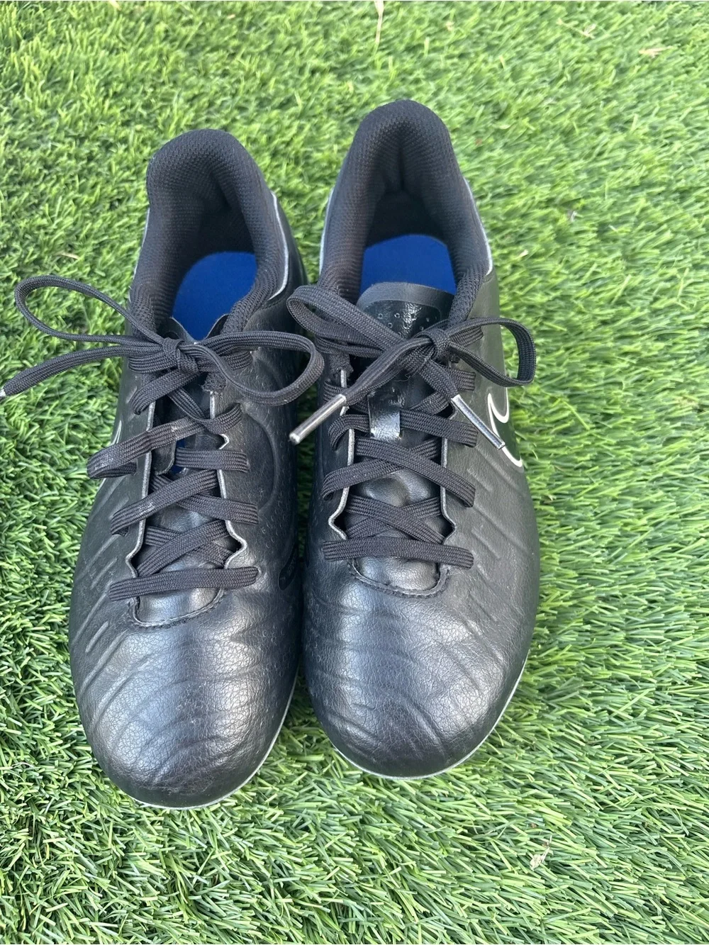 Nike Kids Black Soccer Cleats with Blue Accents